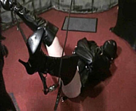 Leather Fantsy 1 - Time to resign the slave in a less fortunate position. Clad in a leather straitjacket, mask and high boots, the slave on the ground. His legs hoisted high. What will be the mistress plan after she steps into his crotch in a playfull moment?